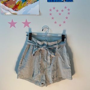 Green tie waist shorts